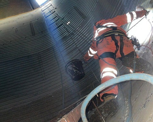 Silo cleaning repairs and maintenance performed by Avisan Technician