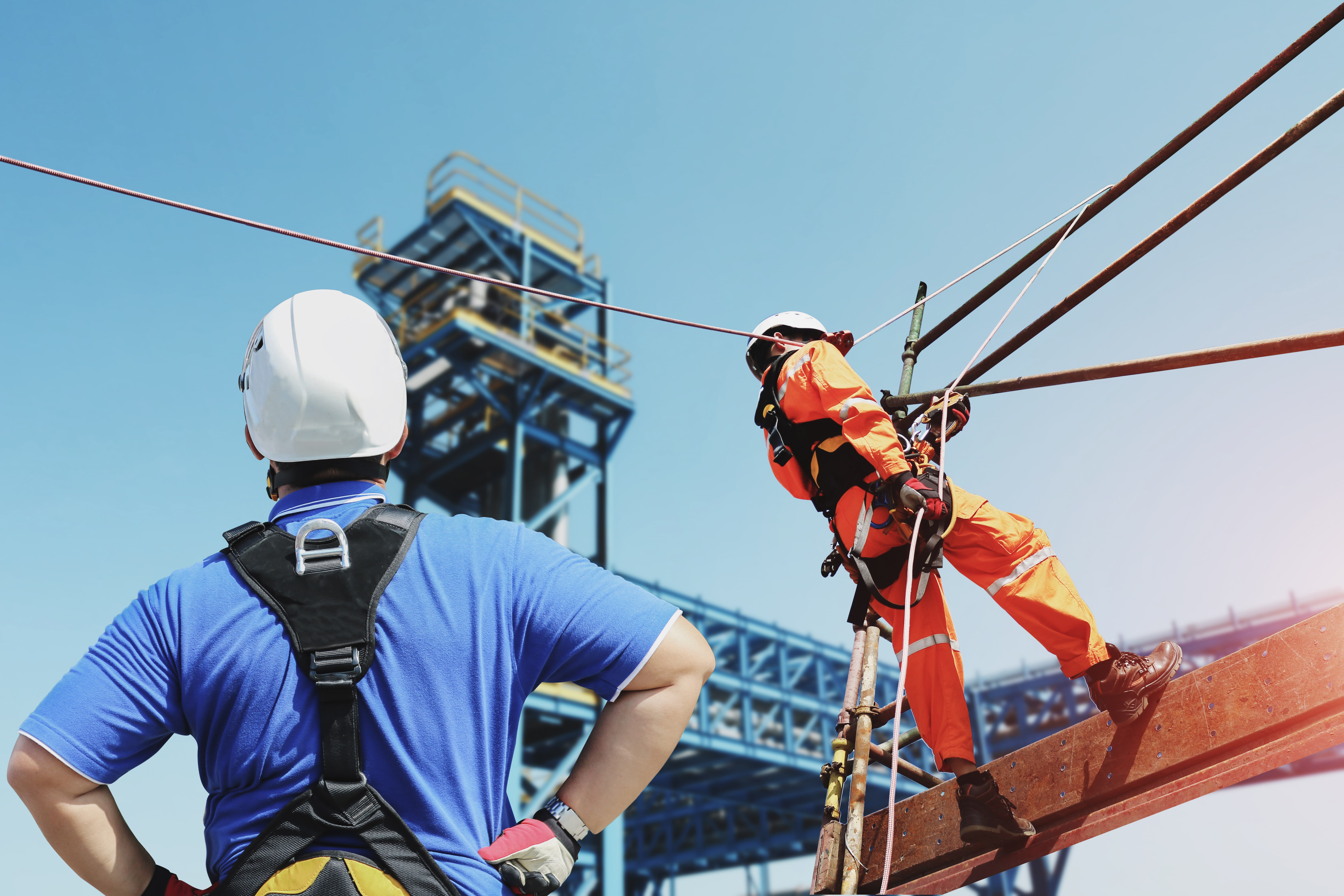 Rope access technician being trained by IRATA trainer