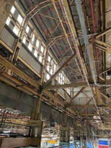 interior of Ford warehouse showing metal beams