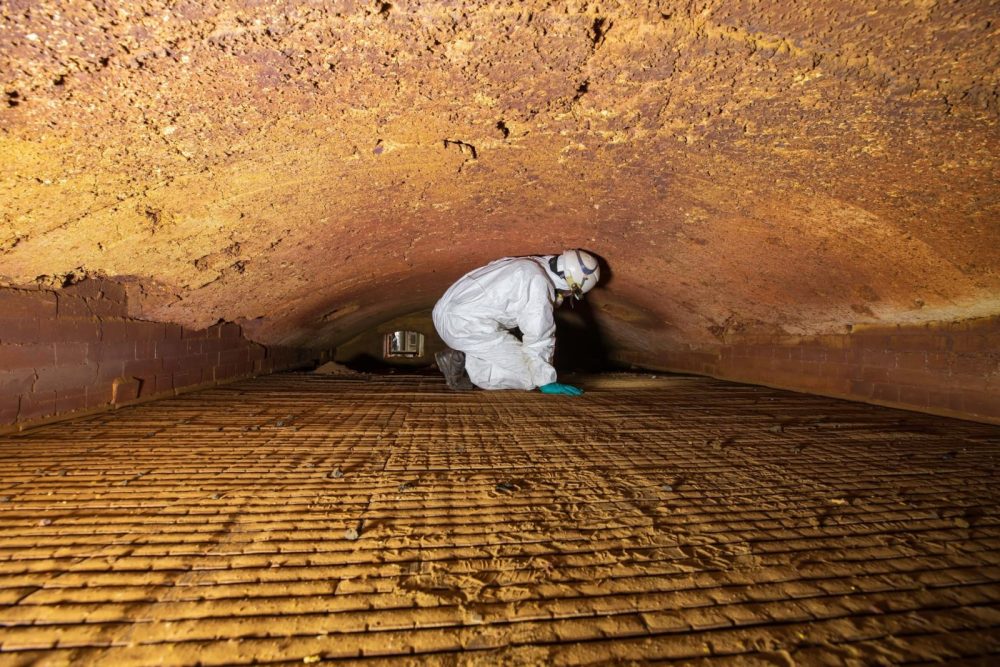 Avisan rope access technician works in confined space